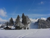 Unser Gästehaus in den Bergen (Winter)