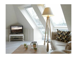 Muschel Whg. Schildkröte - Blick in den Wohnbereich mit Fernseher