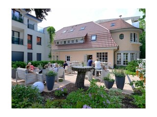 Muschel- Blick auf das Café