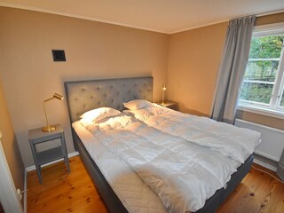 Schlafzimmer mit Doppelbett