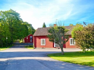 Blick auf "Flygeln" (im Hintergrund Haus "Vagnslidret")