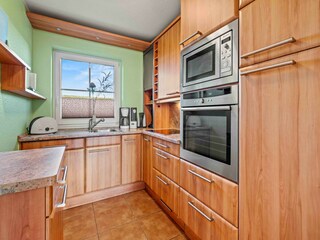 abgetrennte voll ausgestattete Küche