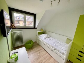 Zweites Schlafzimmer mit ausziehbaren zusätzlichen Bett