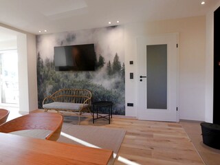 WanderLodge - Wohnküche mit Kamin und 55" Smart-TV