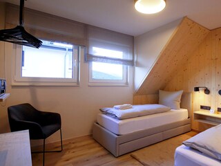 WanderLodge - Schlafzimmer 2 mit zwei Einzelbetten