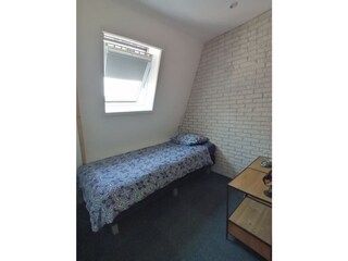 slaapkamer met 1 persoonsbed