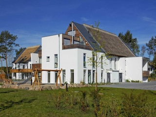 Appartementhaus mit Spielplatz