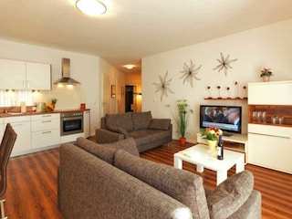 Wohnzimmer und integrierte Küche