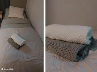 ordentlich gemachtes Einzelbett