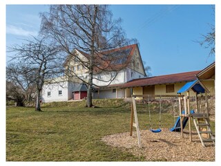 House from garden with playground