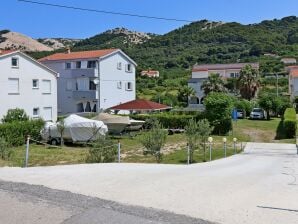 Two bedroom apartment with balcony Barbat, Rab A-24547-b