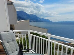 Two bedroom apartment with balcony and sea view Pisak, Omiš A-1009-b
