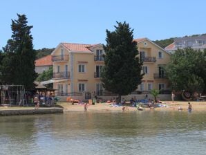 Two bedroom apartment near beach Kraj, Pašman A-3460-d