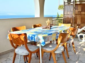Two bedroom apartment near beach Pisak, Omiš A-658-b