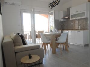 Two bedroom apartment with terrace and sea view Okrug Gornji, Čiovo A-13859-b