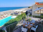 Ferienwohnung mit Pool und Meerblick