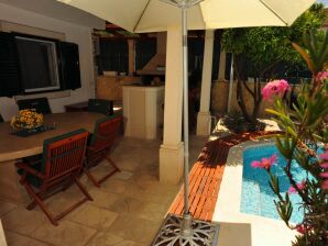 Two bedroom apartment with terrace and sea view Sutivan, Brač A-16846-a