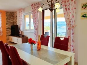 Two bedroom apartment with terrace and sea view Šilo, Krk A-18685-e