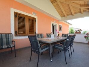 Two bedroom apartment with terrace and sea view Čižići, Krk A-19375-b