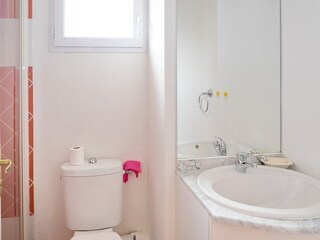 Small bathroom with shower in the holidayhome