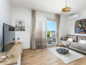 One bedroom apartment with balcony and sea view Seget Donji, Trogir A-23273-b