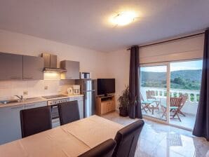 Two bedroom apartment with balcony Kampor, Rab A-23600-b