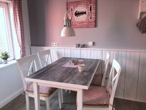 Tempo di mare del pescatore con camino