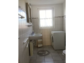 Duschbad mit Waschmaschine