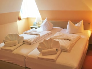 Schlafraum mit Boxspringbett