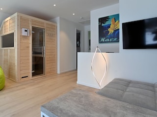 Galerie mit Sauna und Schlafsofa