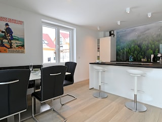 living-dining area with open kitchen