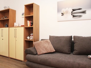 kleines Zimmer mit Schlafsofa