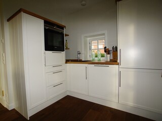 DIe vollausgestattete Küche lässt keine Wünsche offen