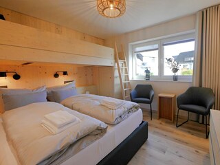 Junior-Schlafzimmer mit Sitzgruppe