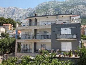 Two bedroom apartment with balcony and sea view Makarska A-21911-e