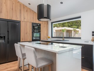 Fully equipped kitchen with modern appliances