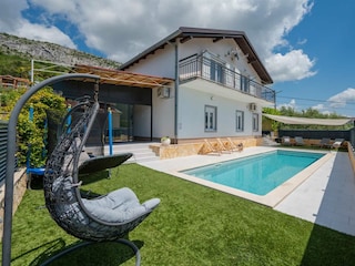 Private Family Oasis with a Heated Pool