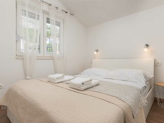 Bedroom No.5 -16m² space with a luxurious king-size bed