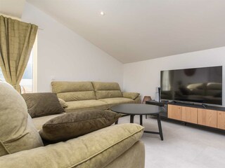 open-plan living area with a terrace