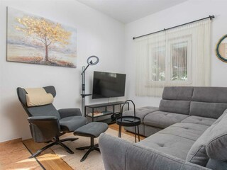 Guests can enjoy a PlayStation 5 for gaming or movies.