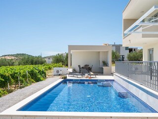 Take a dip in the pool and enjoy instant refreshment.