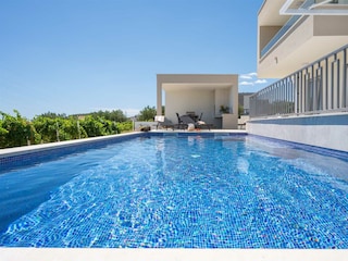 Take a dip in the pool and enjoy instant refreshment.