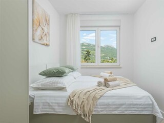 The second bedroom, also located on the first floor.