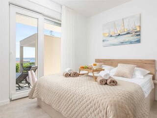 The ground floor features a generously sized bedroom.