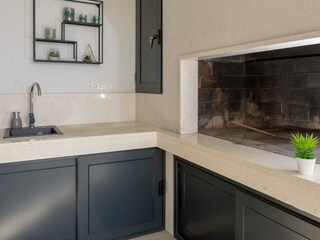 Outdoor kitchen with barbeque