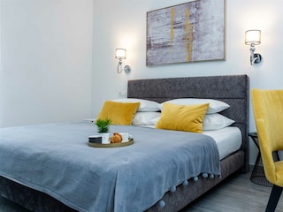 Another comfortable space with a king-size bed.