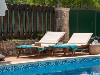 A sun umbrella is available for shade when desired