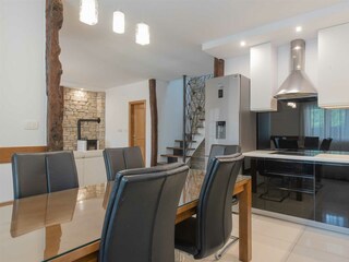 A spacious dining area for eight people