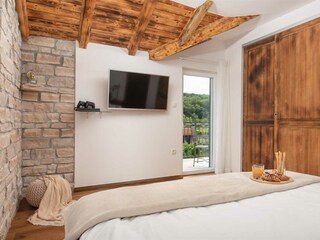 Also features television and balcony