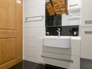 A shared family bathroom with a bathtub